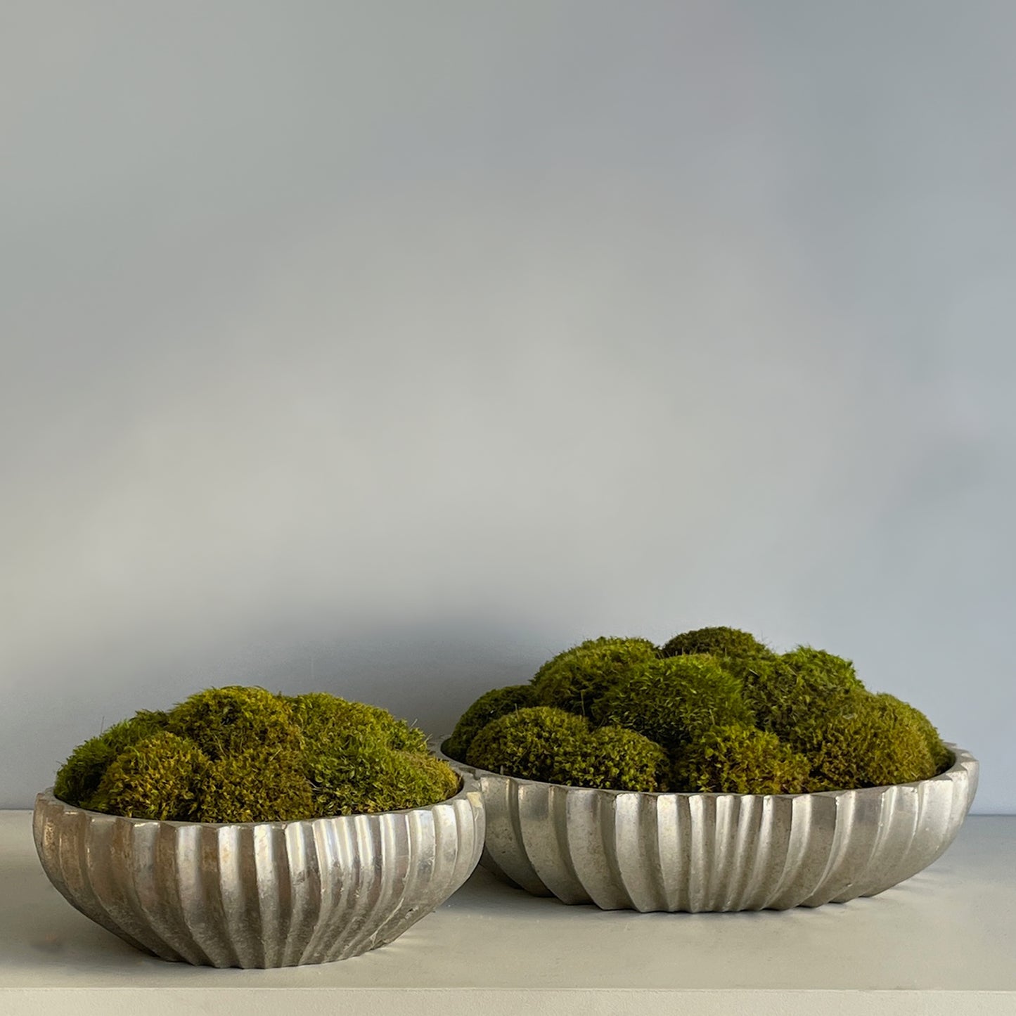 Deco Moss Bowl set, featuring fluted aluminum planters in two sizes.