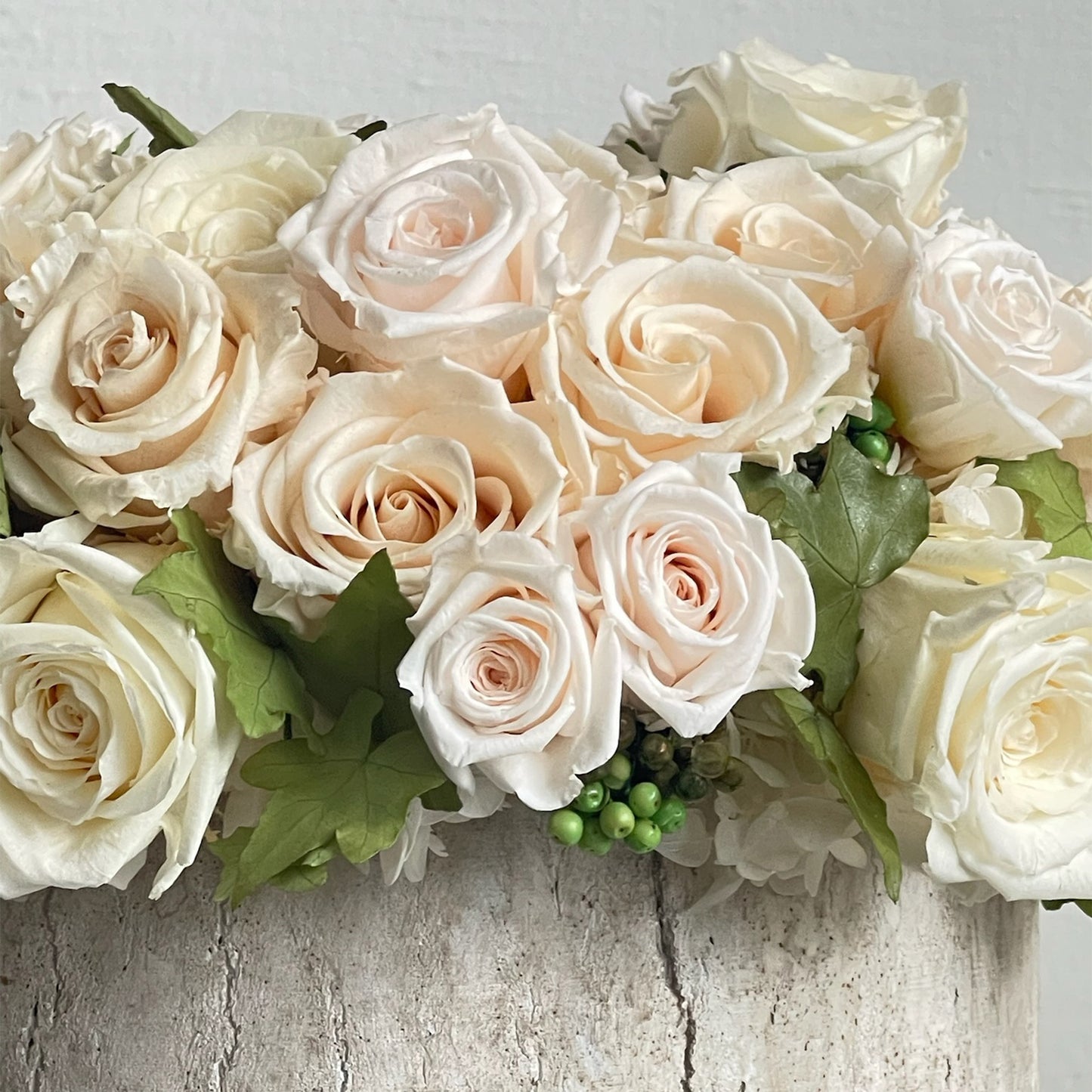 Detail of preserved rose and ivy composition in Ivy Rose arrangement by Los Angeles Floral Company.