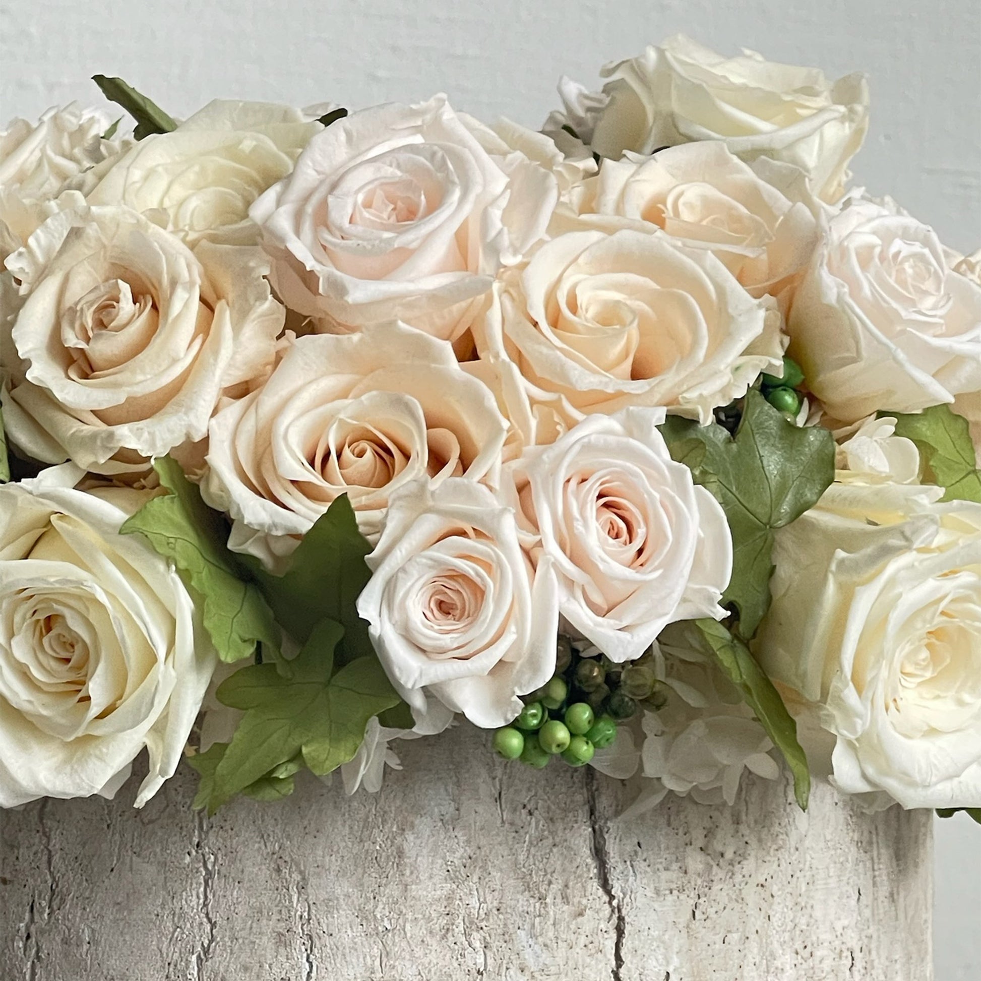 Detail of preserved rose and ivy composition in Ivy Rose arrangement by Los Angeles Floral Company.