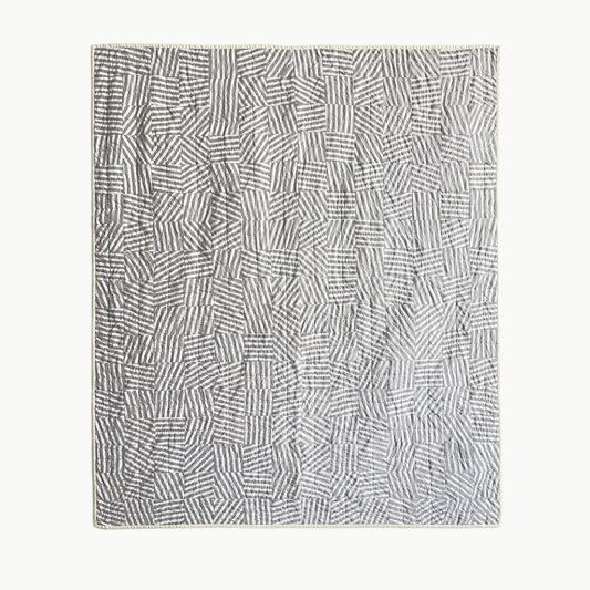  Hand-stitched ‘Stripe Study 1’ throw-size quilt by Los Angeles Floral Company, featuring a playful disruption of intersecting stripes in various directions.