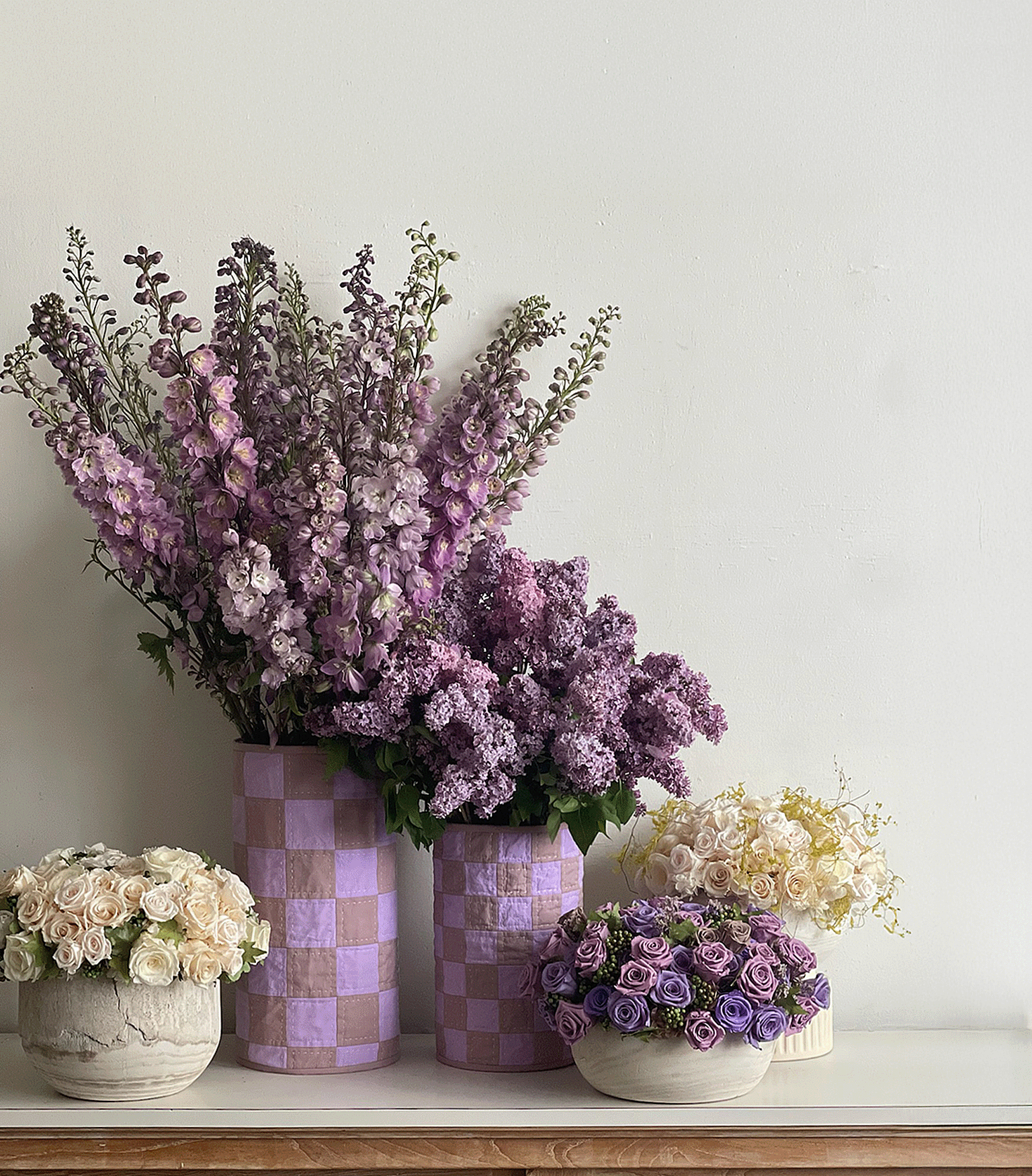 Lavender Lilac Quilt Vases styled with lilac and larkspur blooms, surrounded by seasonal preserved flower arrangements.