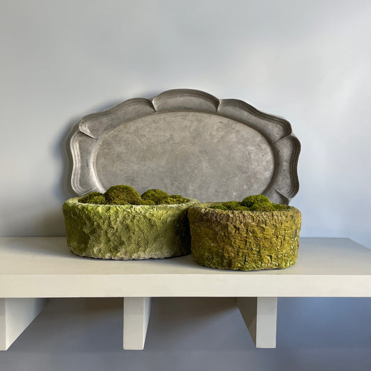 Set of Moss Stone, showcasing natural limestone texture and vibrant moss.