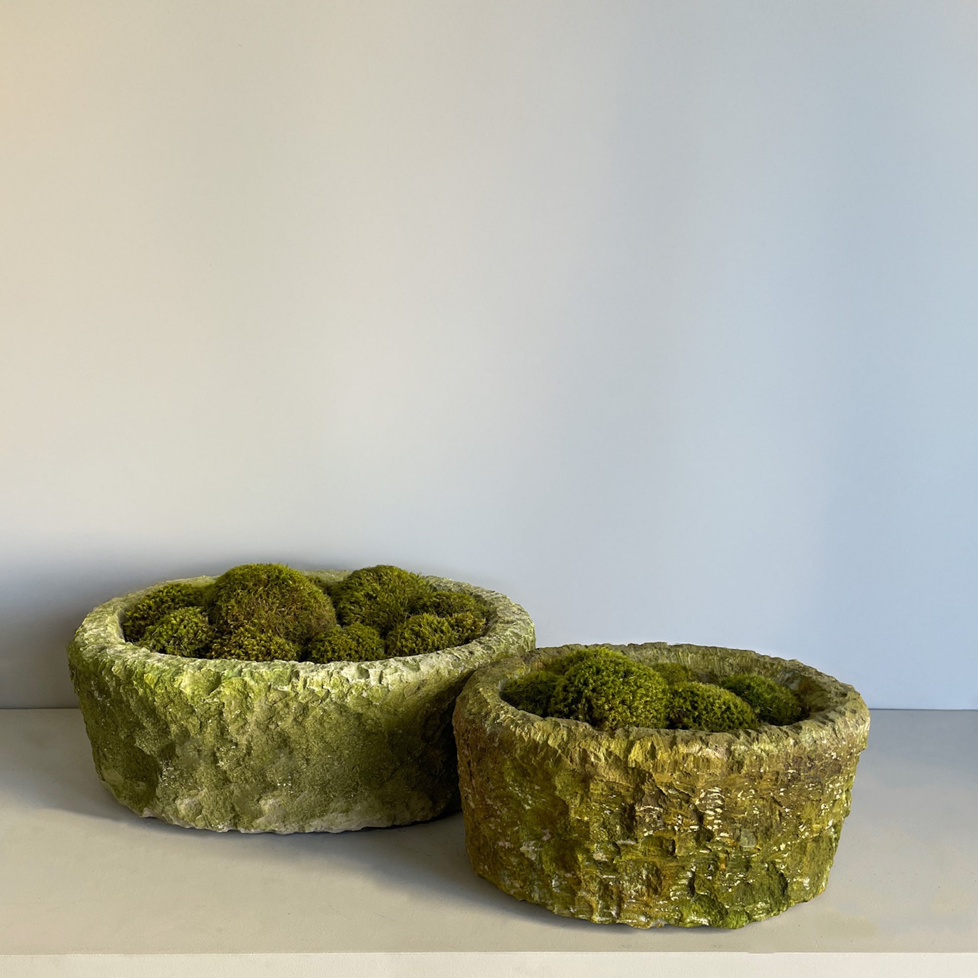 Set of Moss Stone , showcasing natural limestone texture and vibrant moss.